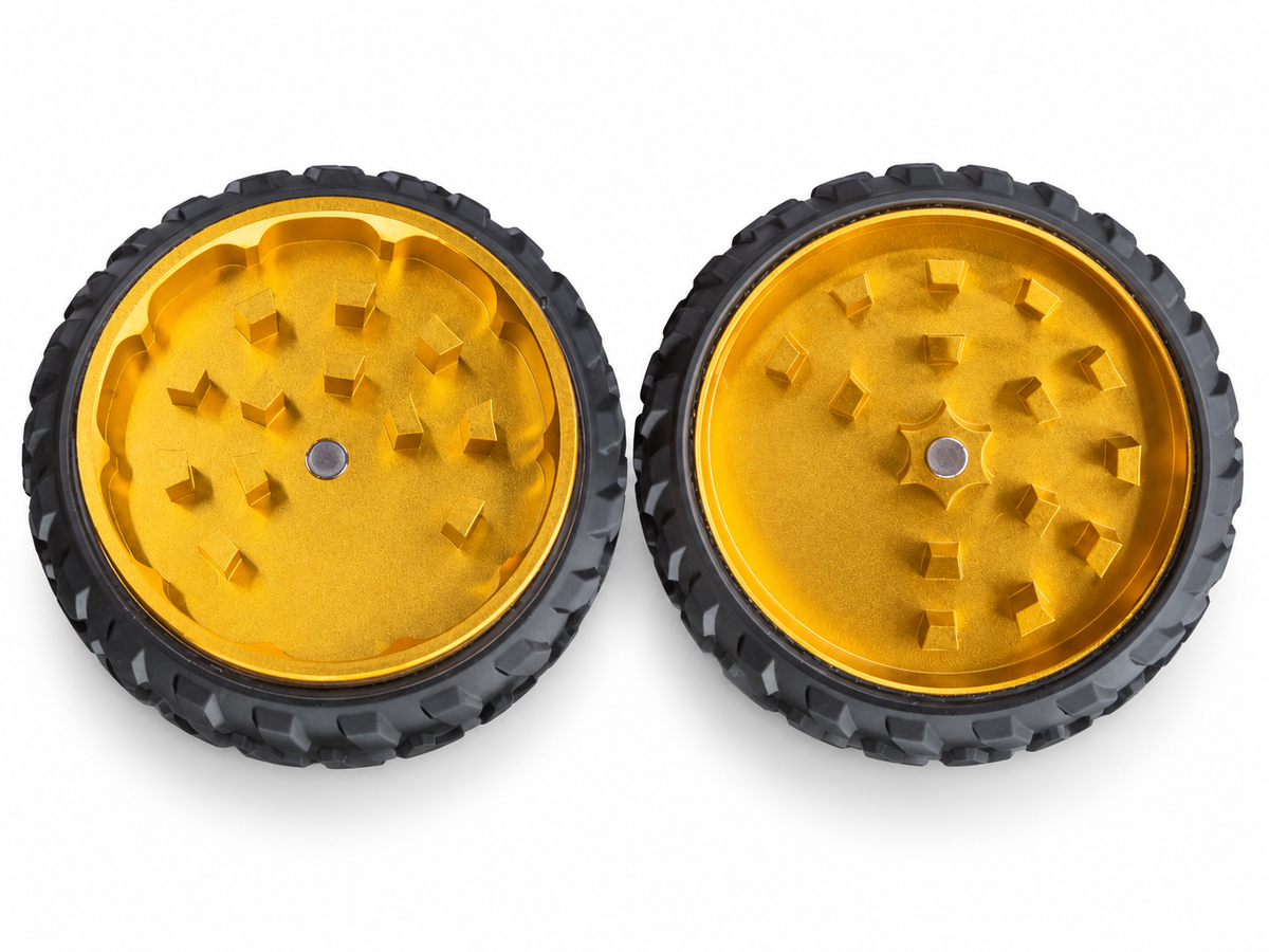 GR324 two-piece black tire grinder opened showing gold-colored teeth and center magnets