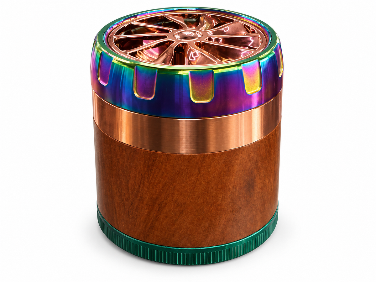 Brown body herb grinder with copper wheel-style lid and rainbow grip rim on white background