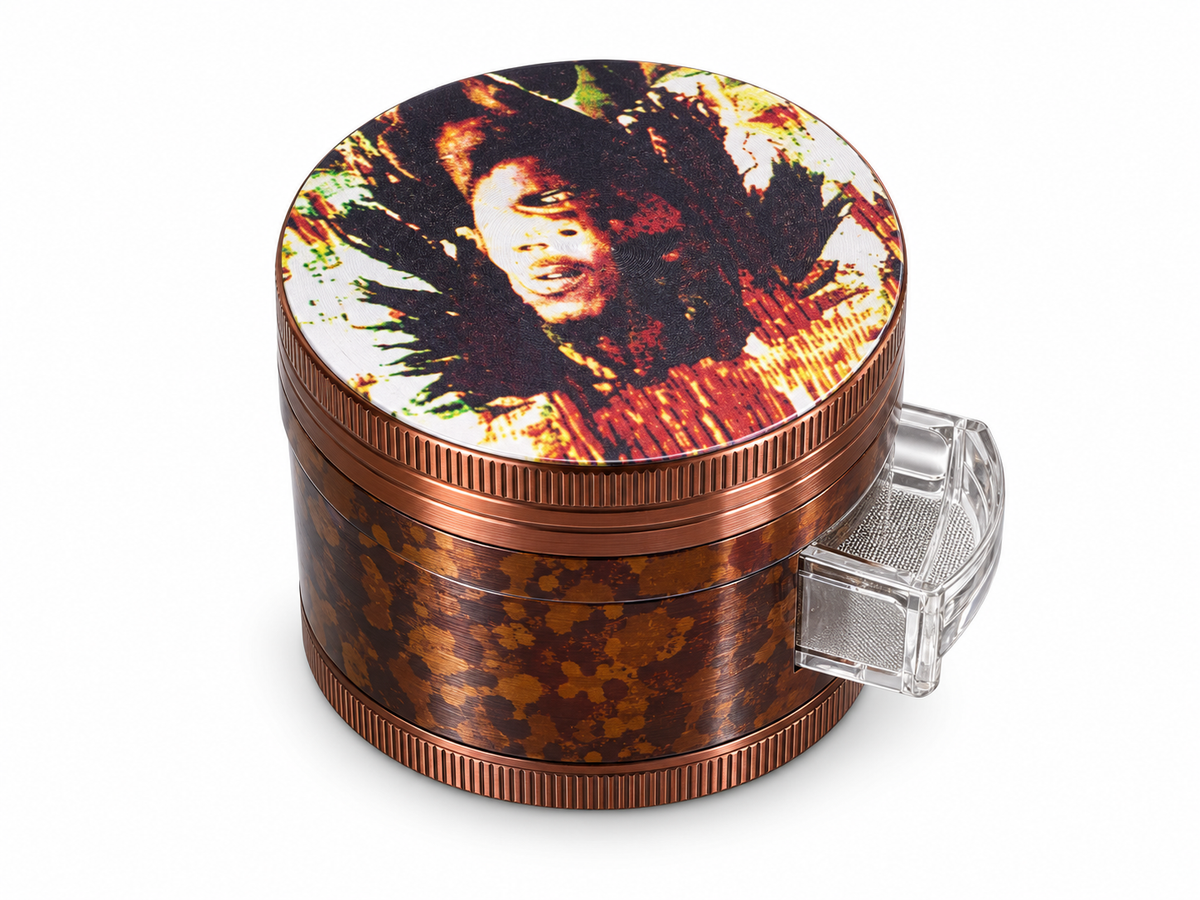 Leaf collage portrait herb grinder with mottled brown body and clear slide-out screen on white background
