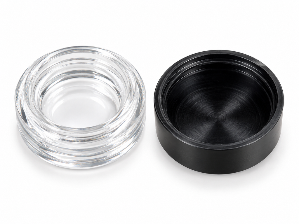 RD-9ML black storage container opened beside its clear lid on white background
