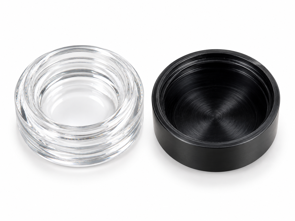 RD-9ML black storage container opened beside its clear lid on white background