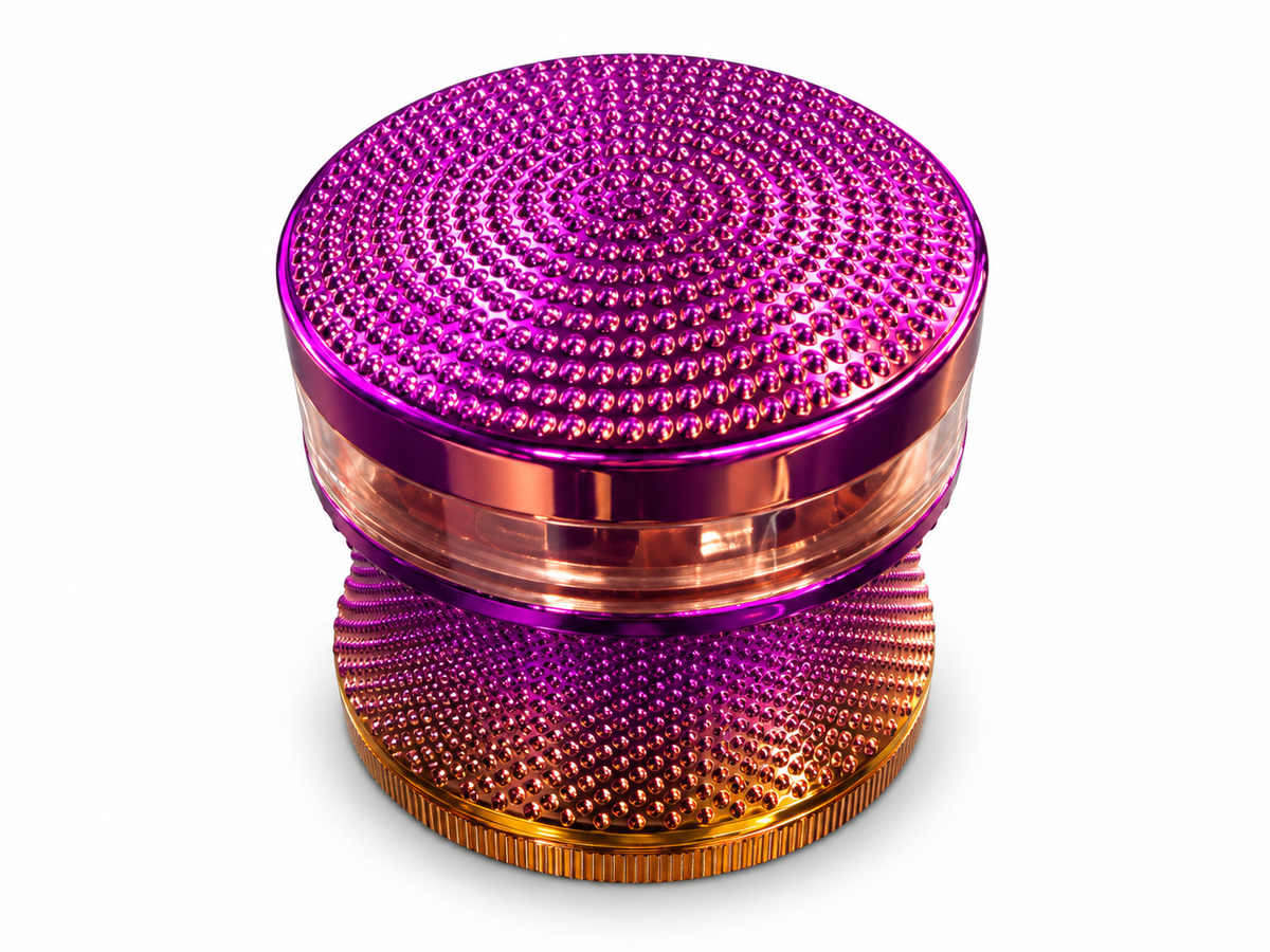 Pink textured rainbow four-piece herb grinder with clear band on white background